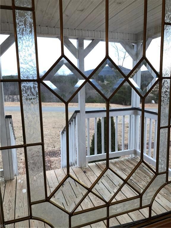 There is a foyer as you enter the front door that lets the morning sunrise shine in.