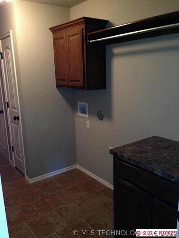 Ceramic Utility with Knotty Alder Cabinets and Cou