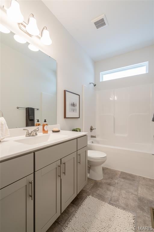 Full bath with vanity,  shower combination, and tile patterned floors