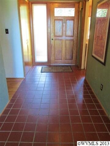 Graceful tiled front entry greets your visitors.