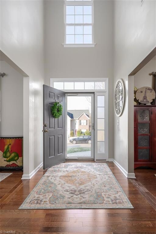 Sunlight streams in from open two story foyer!