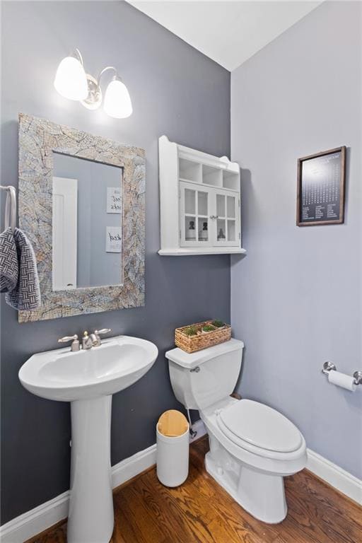 Entryway featuring ornamental molding, stairway, plenty of natural light, light wood-style flooring, and baseboards