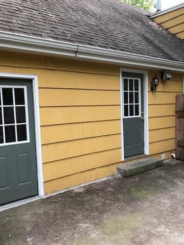 Exterior view...to garages and kitchen off patio