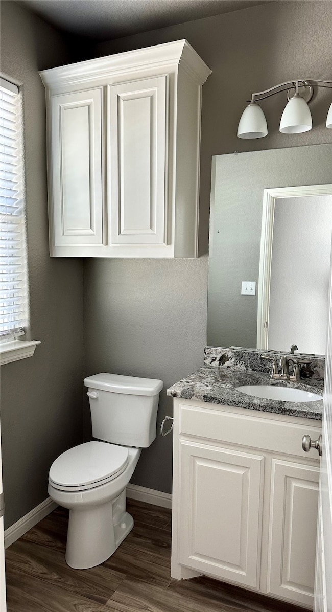 Half bathroom located downstairs for guests.