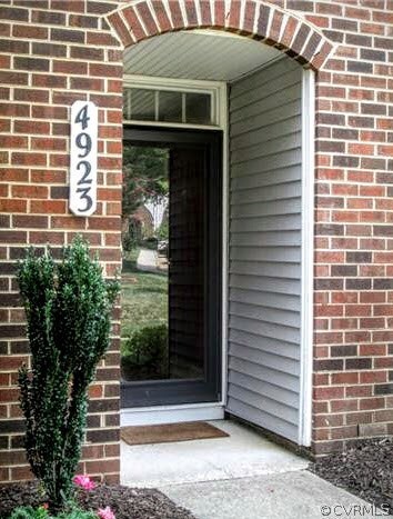 NICE COVERED ENTRY & ASSIGNED PARKING STEPS FROM YOUR CAR!  SECOND ASSSIGNED SPACE AS A BONUS!