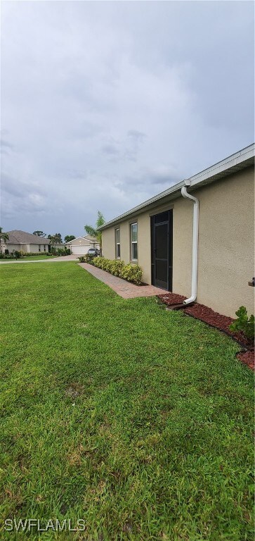 10709 Crossback Ln, Lehigh Acres, FL 33936 - photo 6