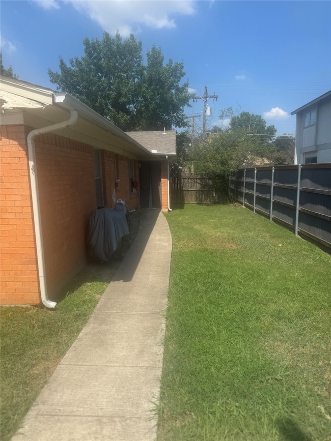 View of fenced backyard