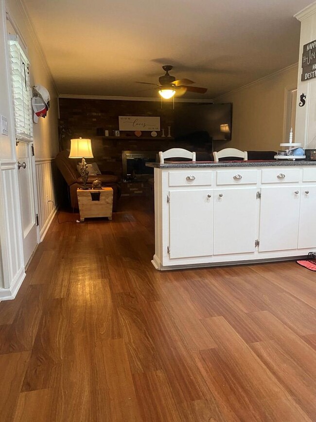 KITCHEN VIEW TO FAMILY ROOM
