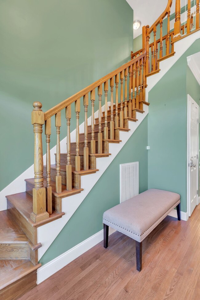 Entry leads to 2 more bedrooms, a media room, and bonus room upstairs!