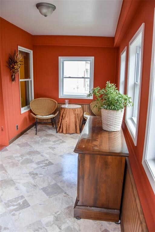 Enter the enclosed porch.