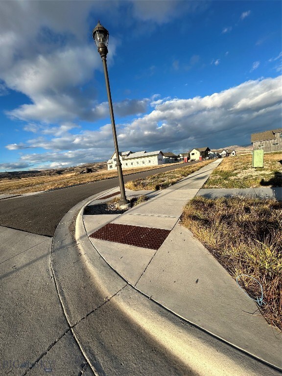 Sidewalks installed on North and West sides of thi