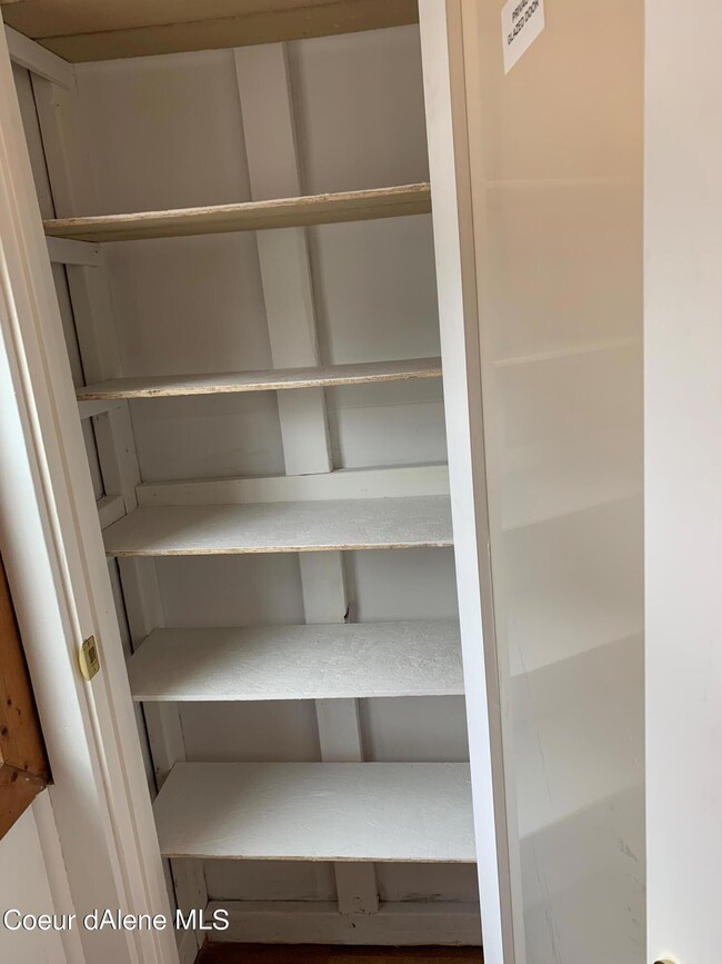 pantry with glass door