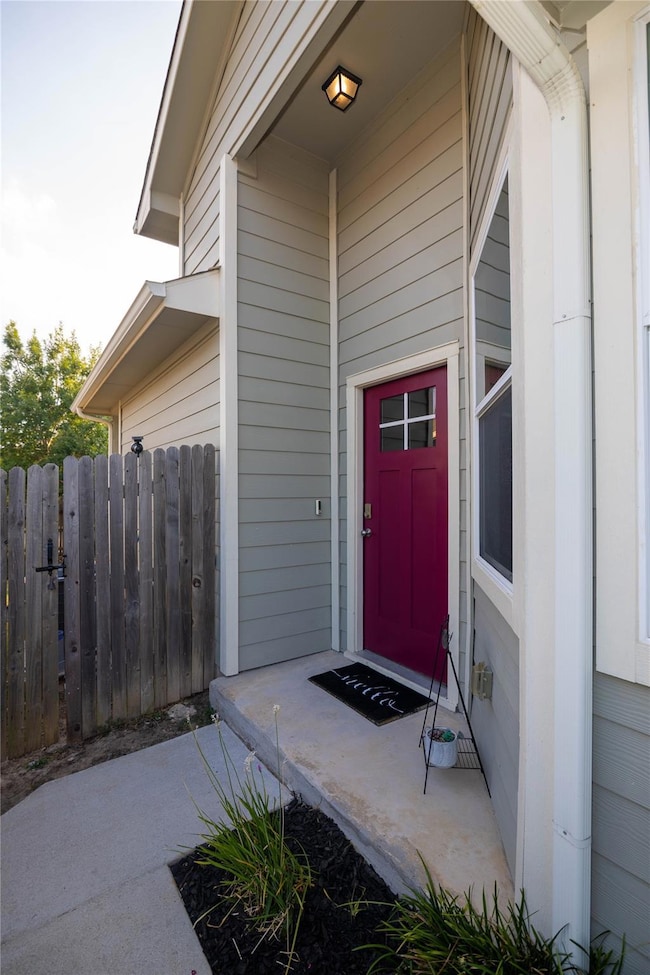 Property entrance featuring a patio area