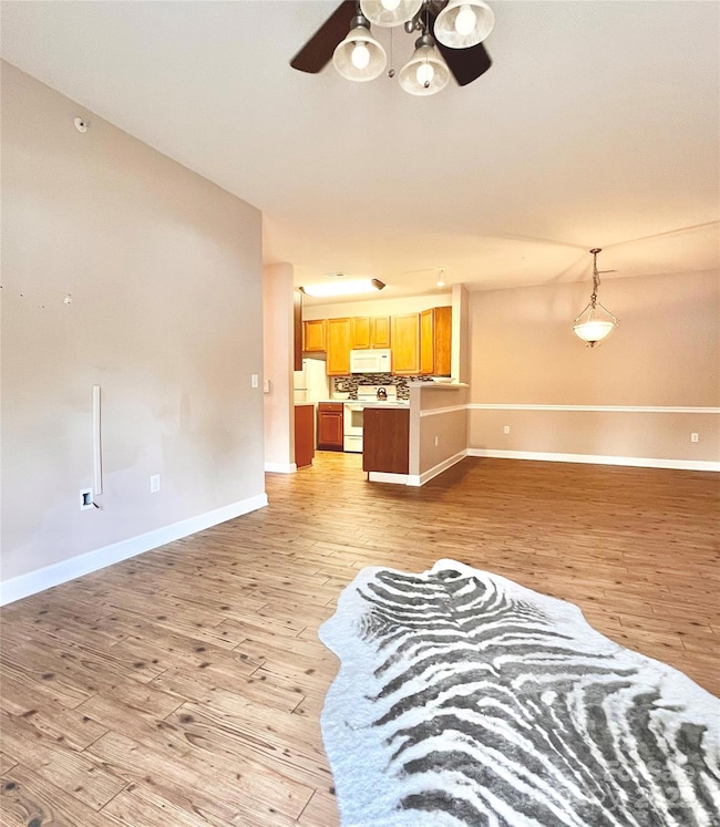 Living room opens up to kitchen and dining room