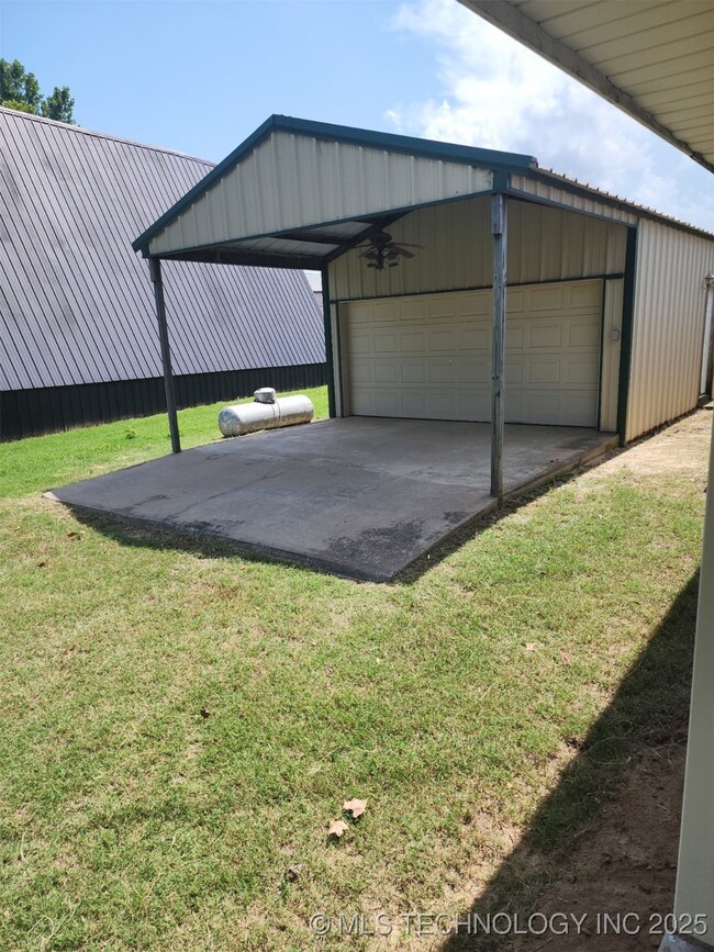 Carport attached to shop