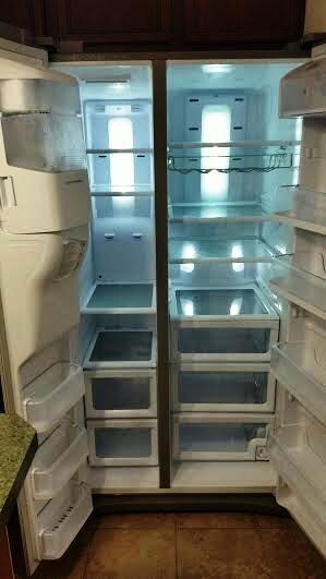 C2. Fridge interior with wine rack. - Co
