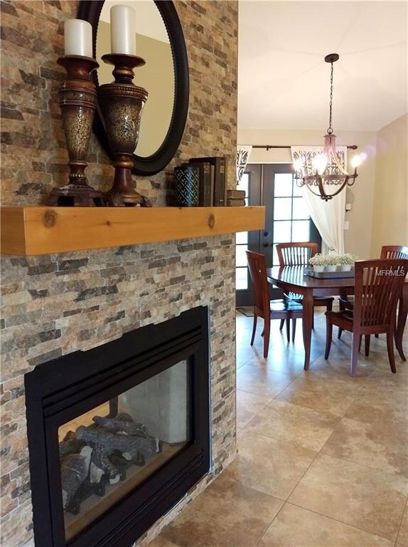 The dining room has french doors leading to the hu