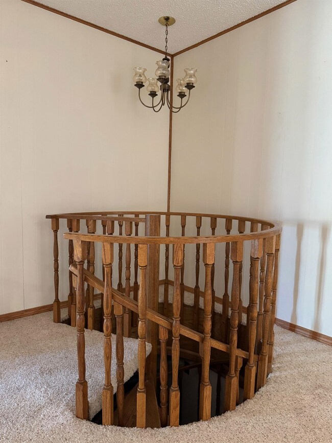 Beautiful staircase to the basement.
