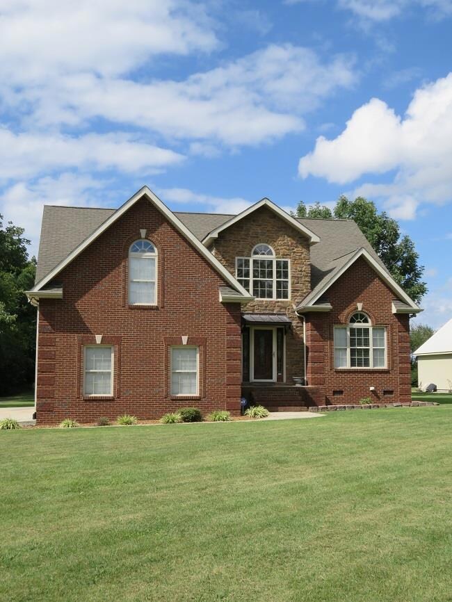 Another angle of this custom built home with 2 car att. & 2 car det. garage