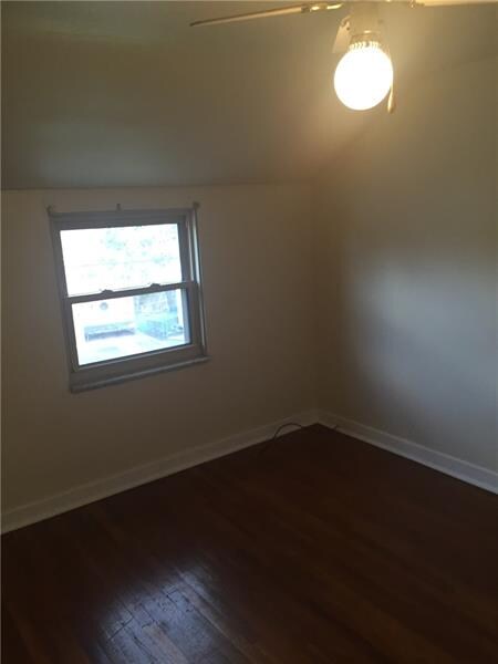 HARDWOOD FLOOR AND CEILING FAN IN 2ND BEDROOM