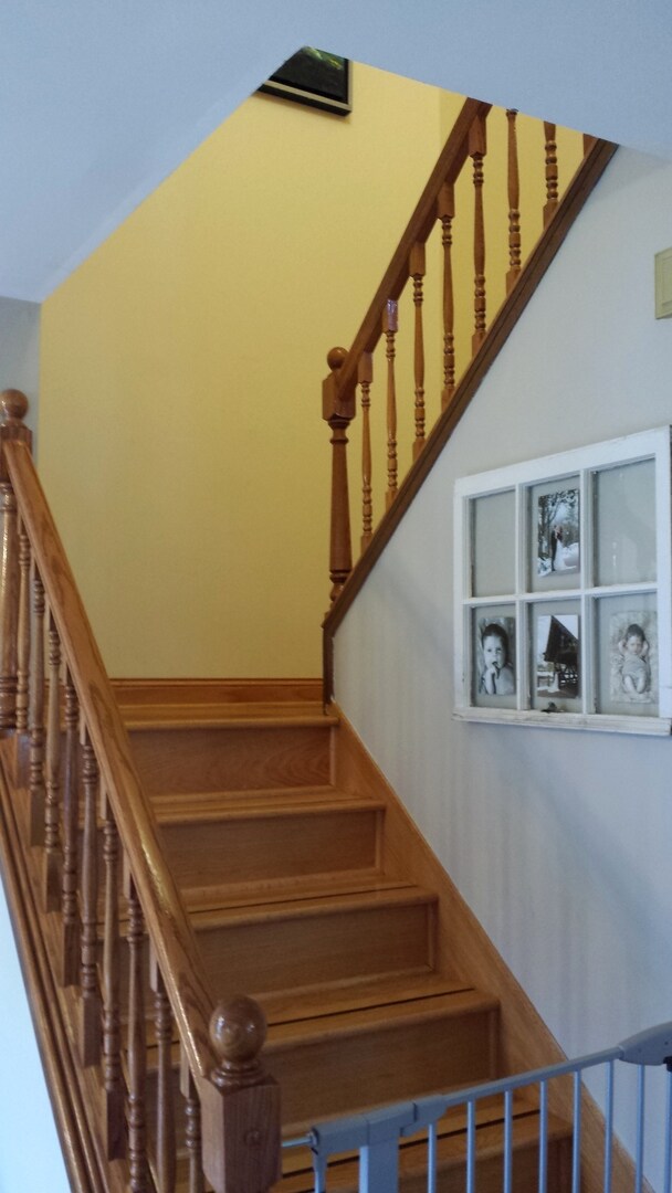 Details of stairway showing hardwood throughout.