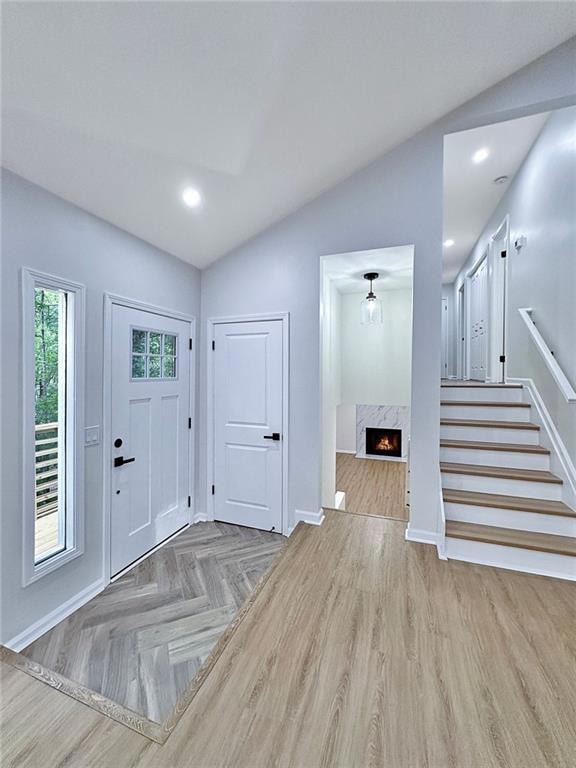 New Front Door with Herringbone Tile in Foyer