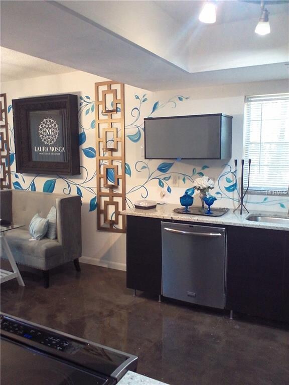 ANOTHER VIEW OF THE KITCHEN AND A SLICE OF THE HEA