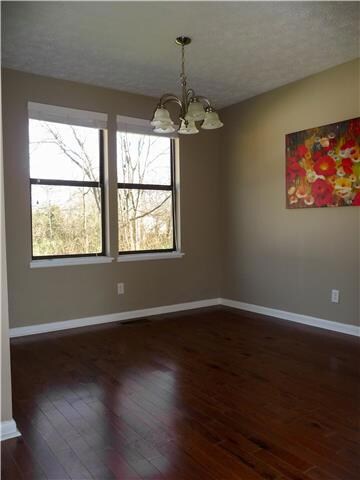 Dining Area has Hardwood Floor and Double Windows for Lots of Light