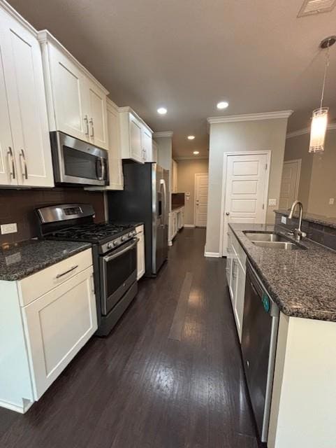 Kitchen featuring stainless steel appliances, a s