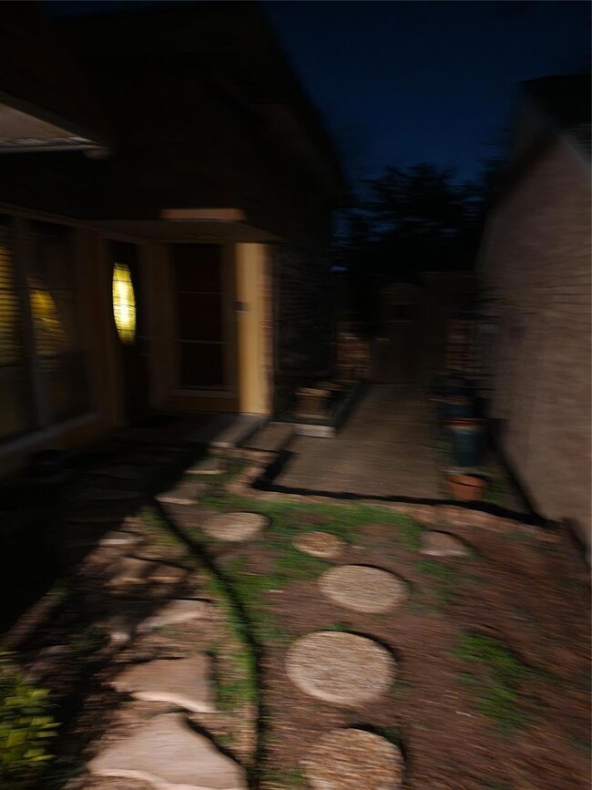 View of yard at twilight