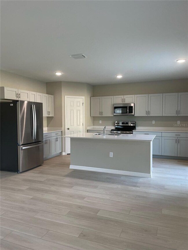 7504 Wallflower Trail, Wesley Chapel, FL 33545 - photo 7