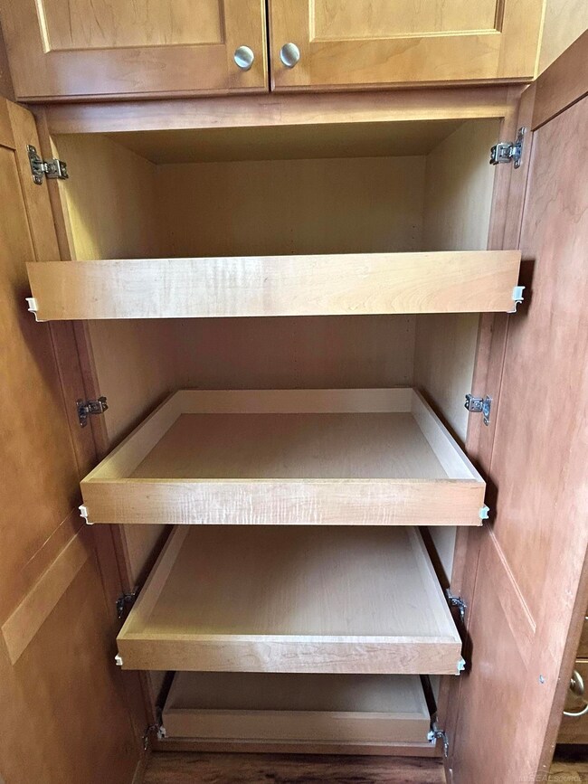 Easy access pull-out drawers in pantry.