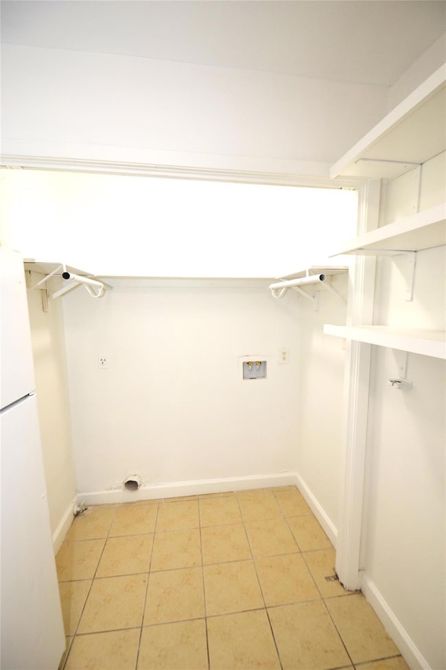 Laundry room featuring washer hookup, hookup for 