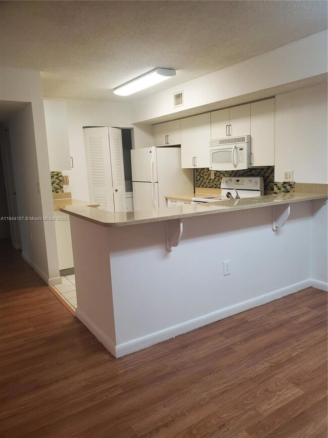 3874 Lyons Rd unit 1126, Coconut Creek, FL 33073 - photo 7