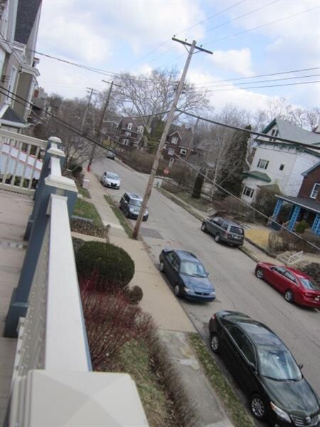 View of the street and neighborhood from the 2nd f