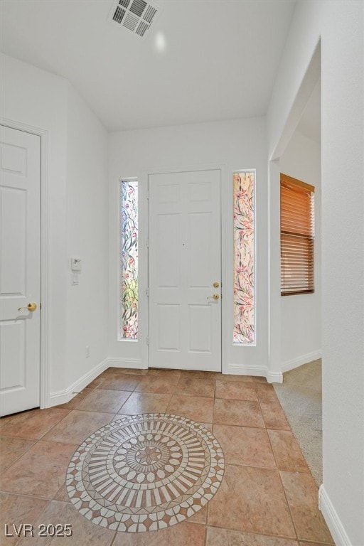 Entryway featuring baseboards