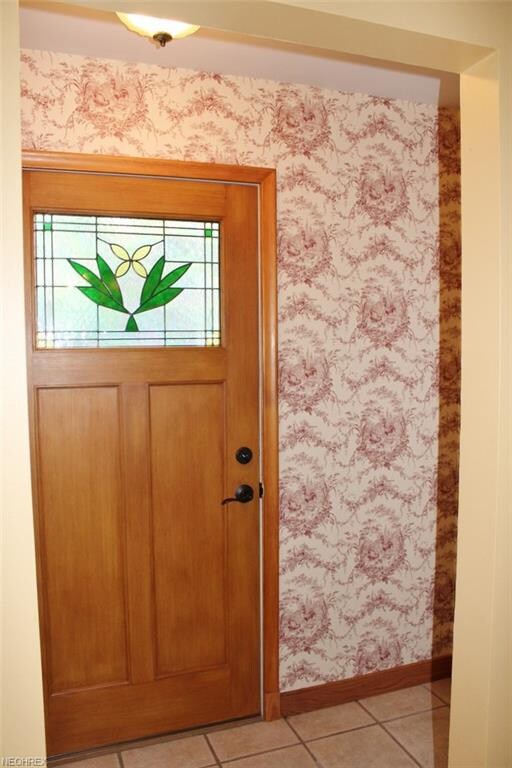 Enter into the tiled front foyer.  Not the beautif