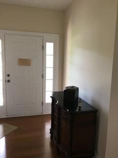 Entrance Foyer and with hardwood into Great Rm and Dining area