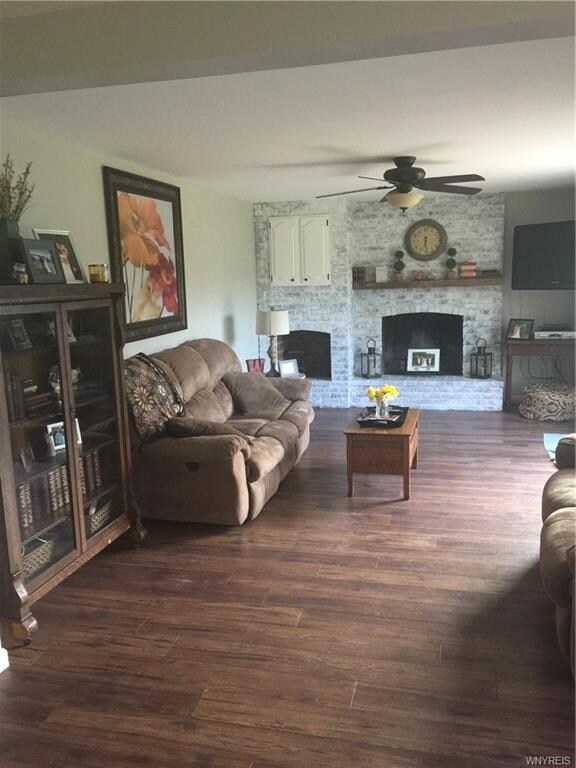 Handscraped floors and gas fireplace