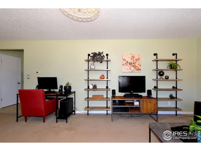 Living Room leads to Dining and Kitchen Areas