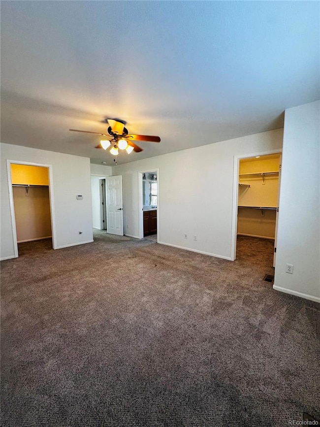 LARGE PRIMARY BEDROOM WITH 2 LARGE WALK-IN CLOSETS