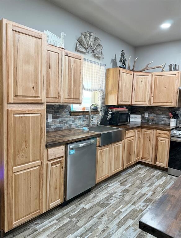 Kitchen with appliances with stainless steel finis