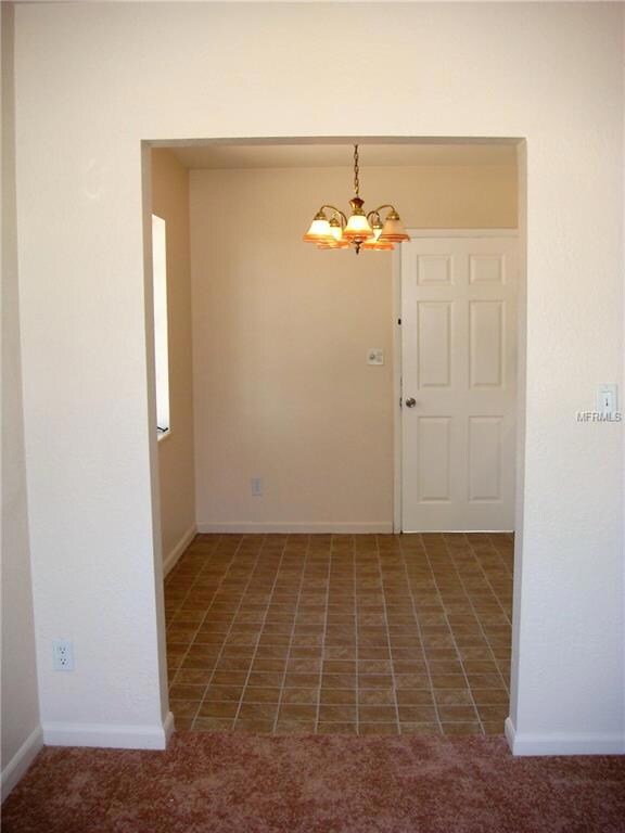 This view is from the living room into the dining area of the kitchen.