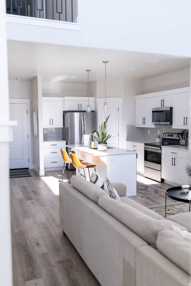 Living area with light wood-style floors