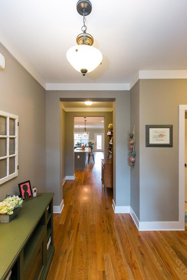 View from front door.  Notice the sand & finished hardwood floors...they are gorgeous and in excellent condition!