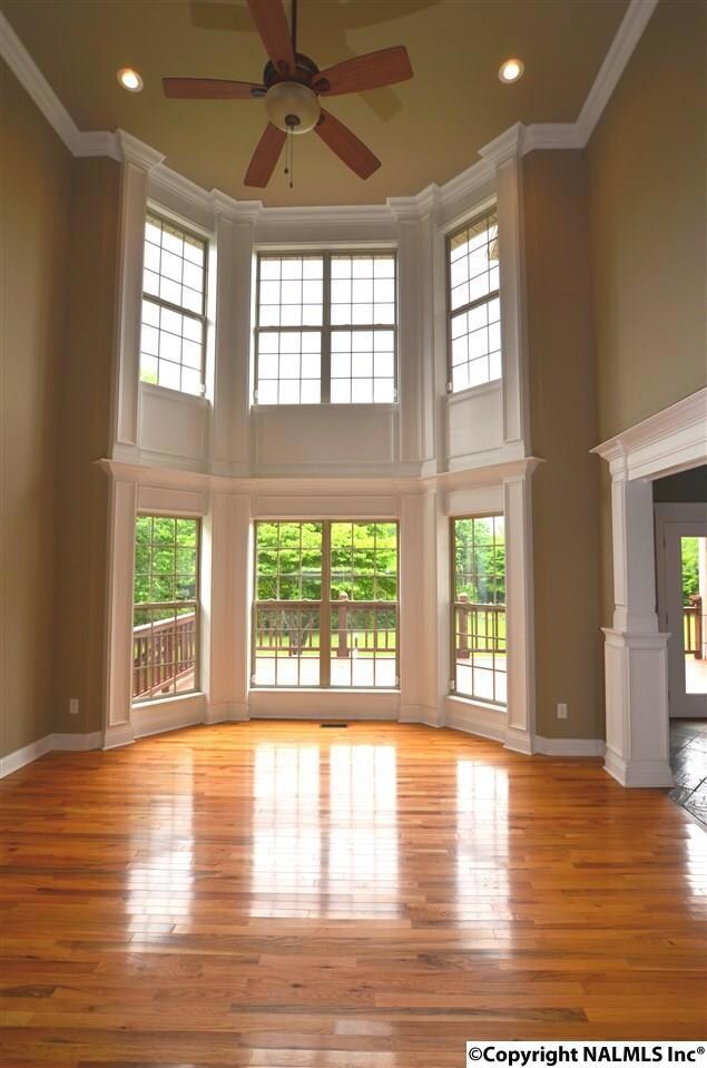 Gleaming hardwood flooring and all this gorgeous trim is very impressive. Ceiling fan and recessed lighting complete this really great, Great Room.