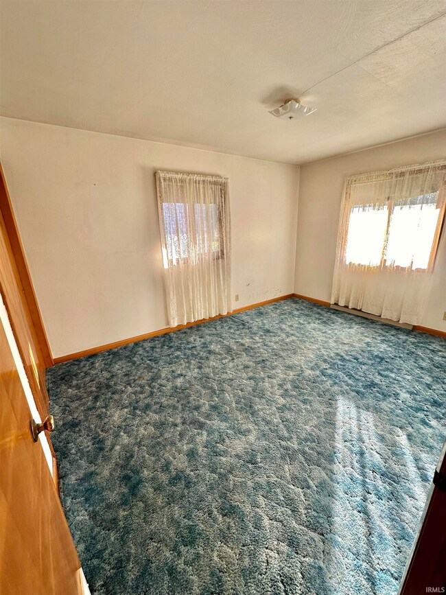 Hardwood flooring under the carpet.