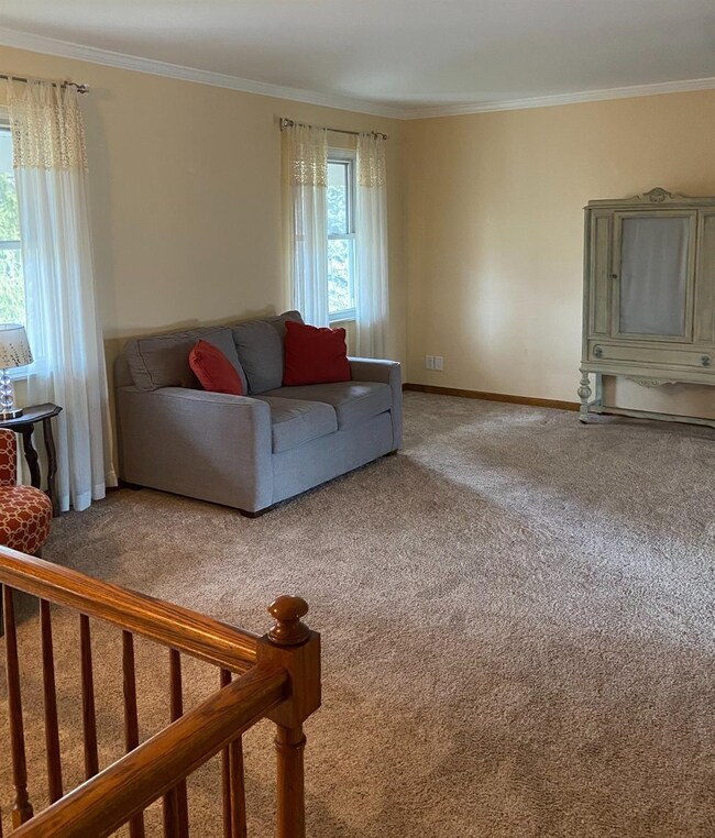 Large family room/sitting area attached to kitchen
