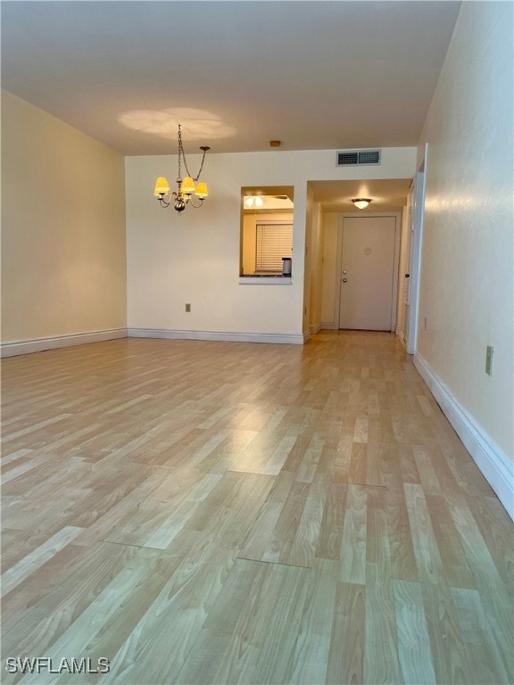 The condo has laminate flooring in the main living