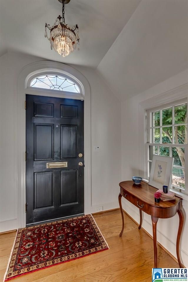 formal entry with leaded glass transom above door